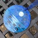 Glass suncatcher with matching ribbon