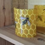 Short fused glass panel with honeybee design