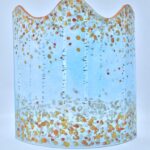 Fused glass panel with autumn birches design and vanilla background