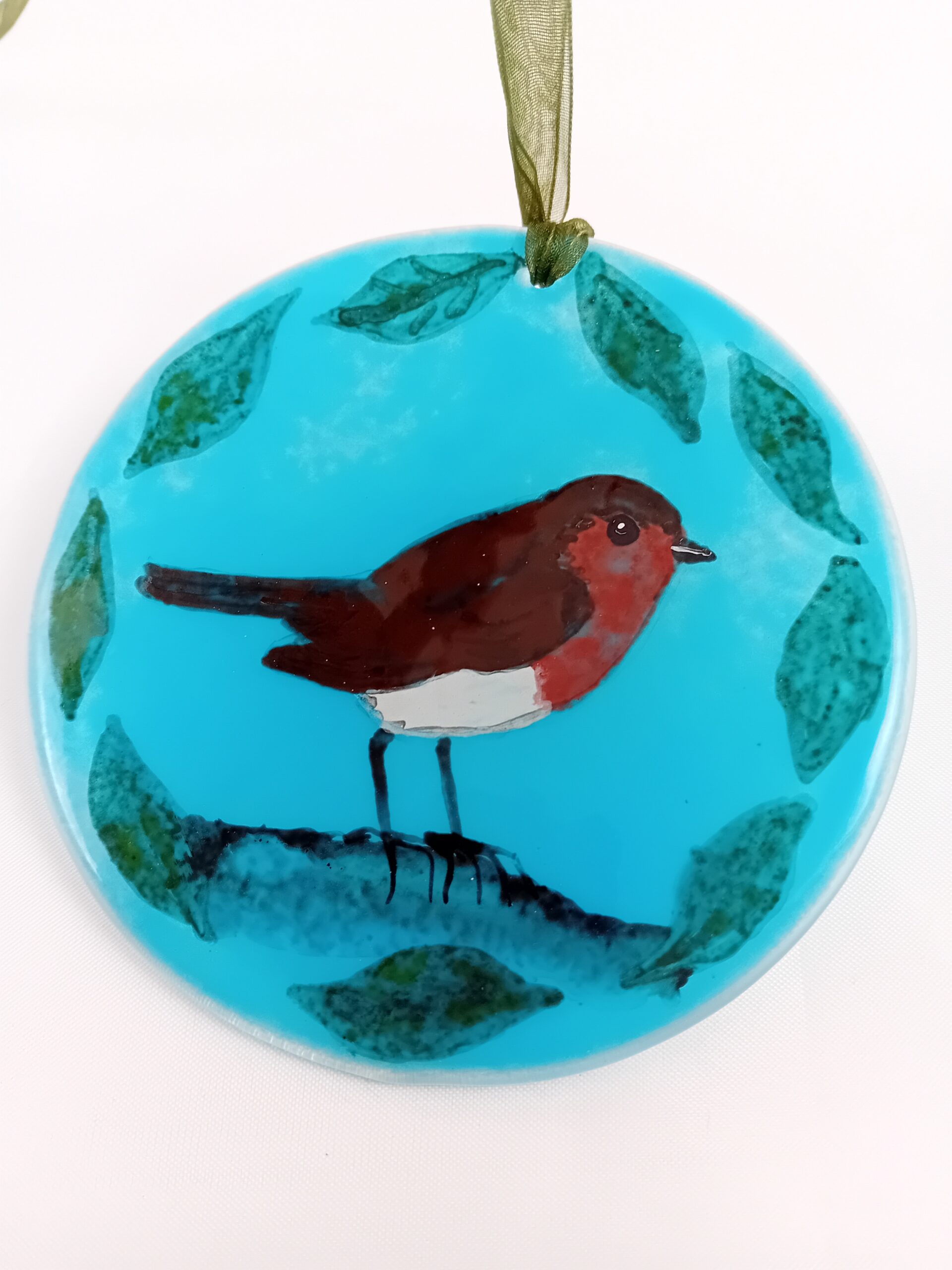 Robin suncatcher on cyan background