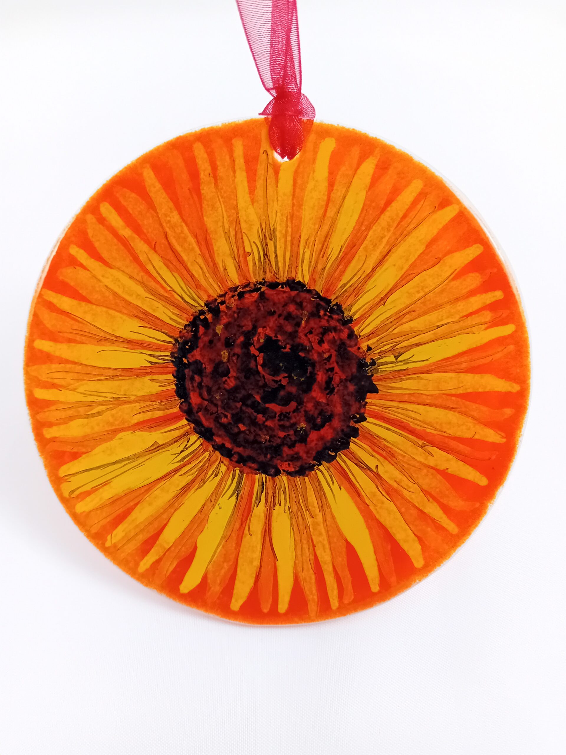 Sunflower suncatcher on red