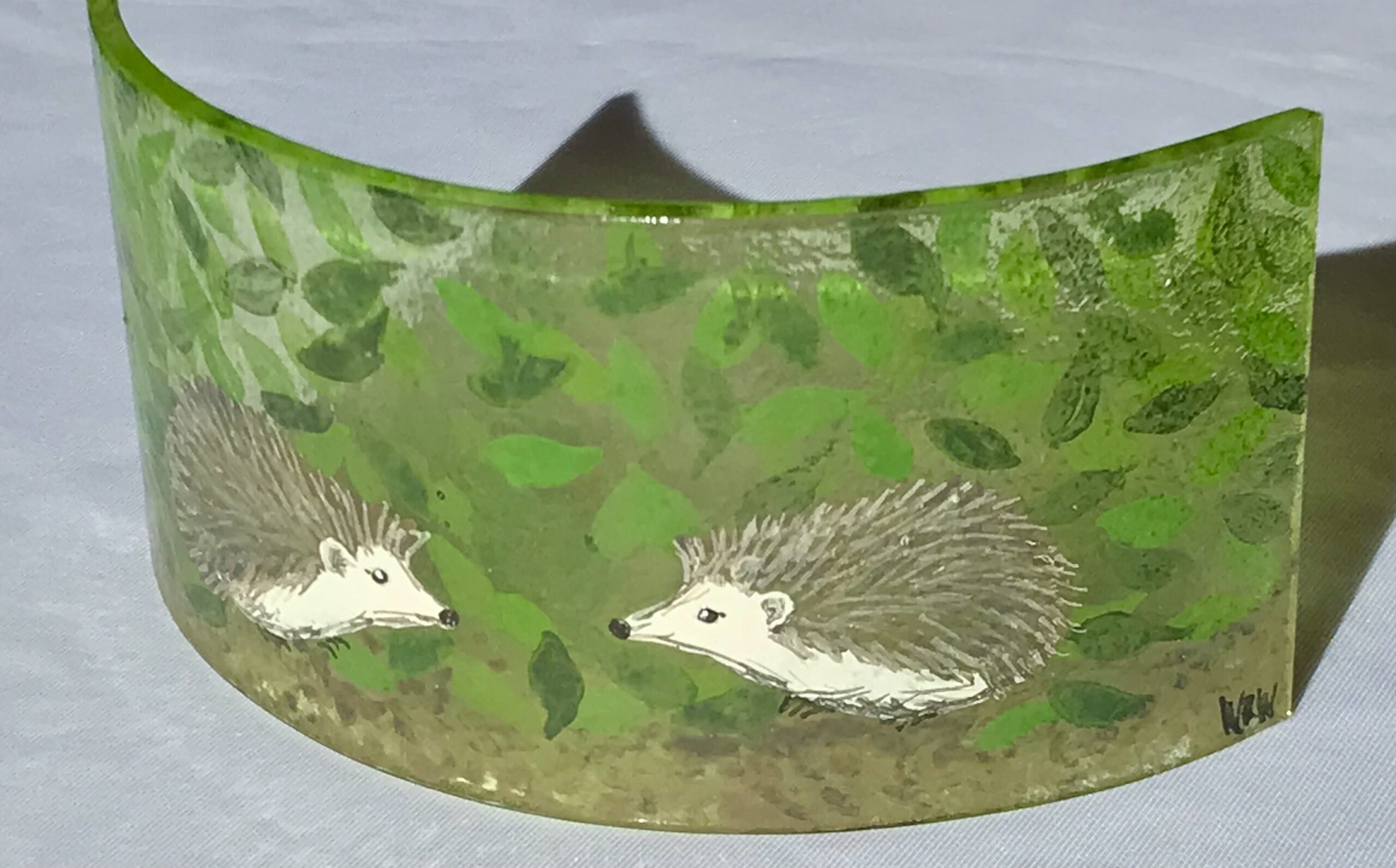 Mini hedgehogs panel on green