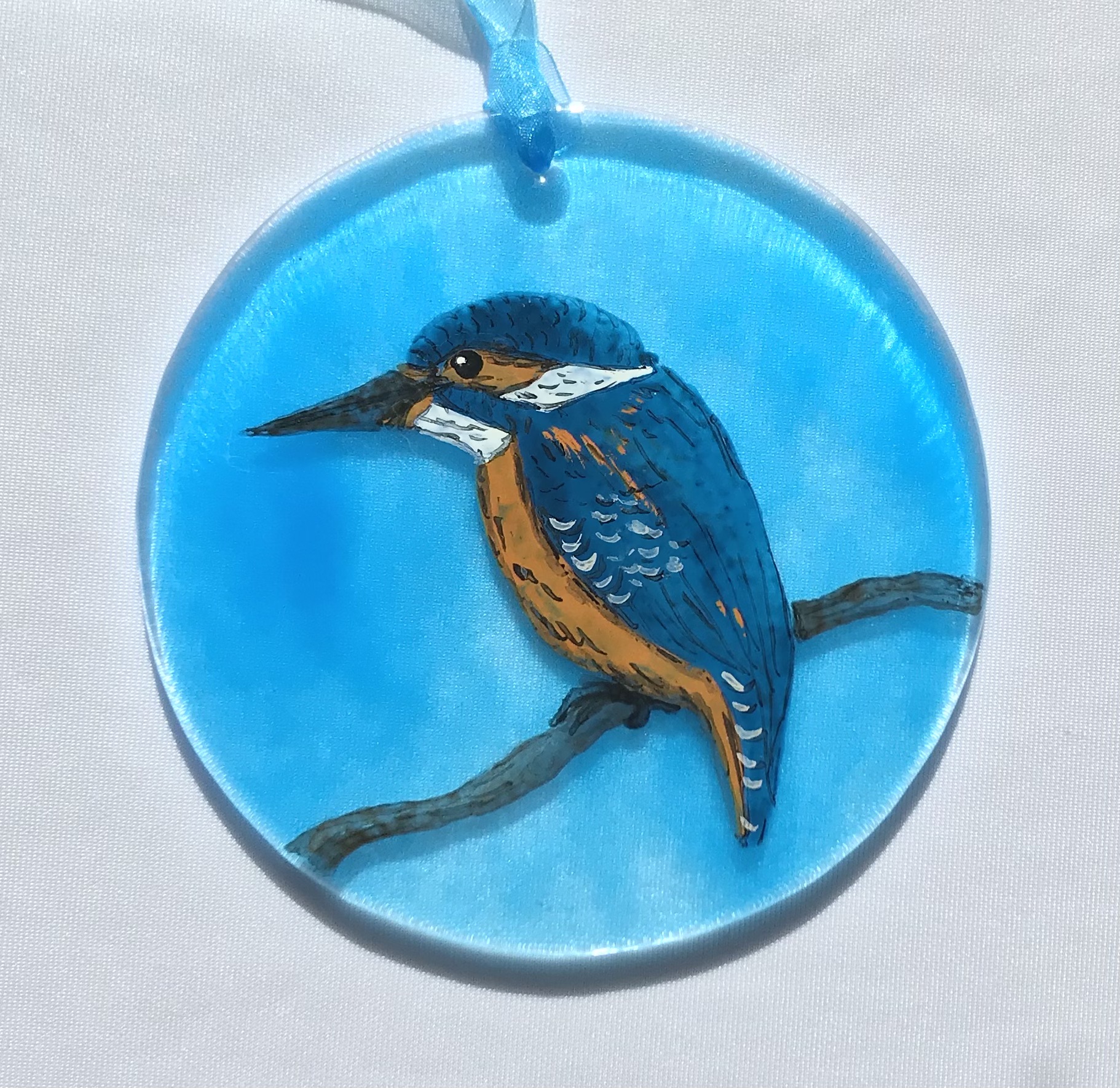 Kingfisher on turquoise background